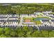 Aerial view pinpoints the location of 247 Christiana Lane #D within a community with a pond and playground at 247 Christiana Ln. # D, Myrtle Beach, SC 29579