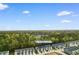 Aerial view showcases the townhomes at 247 Christiana Lane #D in a wooded neighborhood at 247 Christiana Ln. # D, Myrtle Beach, SC 29579