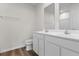 Bathroom features double sink vanity with white cabinets at 247 Christiana Ln. # D, Myrtle Beach, SC 29579