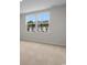 Bedroom with a large window offering views of the neighborhood at 247 Christiana Ln. # D, Myrtle Beach, SC 29579