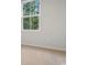 Bright bedroom featuring a large window with a scenic view of surrounding trees at 247 Christiana Ln. # D, Myrtle Beach, SC 29579