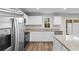 Contemporary kitchen with stainless steel appliances, granite counters, and bright white cabinetry at 247 Christiana Ln. # D, Myrtle Beach, SC 29579