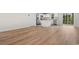 Bright and airy living area with light hardwood floors with views of the backyard through the window at 247 Christiana Ln. # D, Myrtle Beach, SC 29579