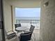 Relaxing balcony features comfortable seating and a stunning ocean view at 2507 S Ocean Blvd., North Myrtle Beach, SC 29582