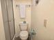 Simple bathroom featuring a toilet, glass-enclosed shower, and towel rack at 2507 S Ocean Blvd., North Myrtle Beach, SC 29582