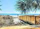 Private beach access via wooden walkway through the dunes to the beach at 2507 S Ocean Blvd., North Myrtle Beach, SC 29582