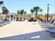 Bright pool deck offers lounge chairs, picnic tables, grills, and ocean views at 2507 S Ocean Blvd., North Myrtle Beach, SC 29582