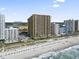 Aerial shot of a beachfront resort with ocean views, sandy beach and resort buildings at 2600 N Ocean Blvd. # 807, Myrtle Beach, SC 29577