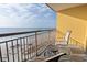 Oceanfront balcony with outdoor seating; watch beach activities and waves at 2600 N Ocean Blvd. # 807, Myrtle Beach, SC 29577