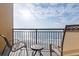 Balcony with chairs and small table with views of the blue ocean at 2600 N Ocean Blvd. # 807, Myrtle Beach, SC 29577