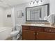 Well-lit bathroom featuring a vanity with granite countertop and a shower-tub combo at 2600 N Ocean Blvd. # 807, Myrtle Beach, SC 29577