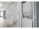 Convenient in-unit laundry area with a stacked washer and dryer setup at 2600 N Ocean Blvd. # 807, Myrtle Beach, SC 29577