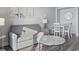 Inviting living space with a gray sofa, marble table, and adjacent dining area at 2600 N Ocean Blvd. # 807, Myrtle Beach, SC 29577