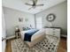 Comfortable bedroom featuring a ceiling fan, stylish decor and a large rug at 2604 Willow St., North Myrtle Beach, SC 29582