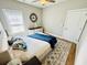 Well-lit bedroom with ceiling fan, and a rug adding warmth and style at 2604 Willow St., North Myrtle Beach, SC 29582
