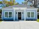 Charming single-story home featuring a modern exterior, manicured landscaping, and a welcoming entrance at 2604 Willow St., North Myrtle Beach, SC 29582