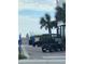 Street view of parked golf carts near a walkway in a coastal community at 2604 Willow St., North Myrtle Beach, SC 29582