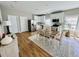 Bright kitchen features white cabinets, stainless steel appliances, and a dining area at 2604 Willow St., North Myrtle Beach, SC 29582