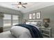 Charming bedroom showcases a cozy bed, coordinated decor, and serene natural light from the window at 2935 Moss Bridge Ln., Myrtle Beach, SC 29579