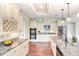 Gourmet kitchen with marble countertops, custom cabinets, and stainless steel appliances; perfect for cooking at 2935 Moss Bridge Ln., Myrtle Beach, SC 29579