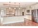 Elegant kitchen with granite countertops, stainless steel appliances, and custom cabinets at 2935 Moss Bridge Ln., Myrtle Beach, SC 29579