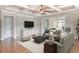 Cozy living room featuring recessed lights, stylish seating, and a view into a sunlit adjacent room at 2935 Moss Bridge Ln., Myrtle Beach, SC 29579