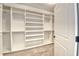 A large walk-in closet with ample shelving and storage options providing an organized space at 2935 Moss Bridge Ln., Myrtle Beach, SC 29579