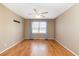 Bedroom with hardwood floors, natural light and ceiling fan at 301 58Th Ave. N, North Myrtle Beach, SC 29582