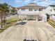 Raised beach house has ample parking, outdoor seating underneath and stairs to the main level at 301 58Th Ave. N, North Myrtle Beach, SC 29582