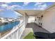 Covered patio with canal view offers outdoor living space and relaxing water views at 301 58Th Ave. N, North Myrtle Beach, SC 29582