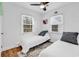 Sunny bedroom with two beds and wood flooring at 313 73Rd Ave. N, Myrtle Beach, SC 29572