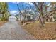 This house shows the charming exterior with brick stairs and a covered porch with black railing at 313 73Rd Ave. N, Myrtle Beach, SC 29572