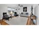 Bright living room with white walls and hardwood floors at 313 73Rd Ave. N, Myrtle Beach, SC 29572