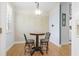 Cozy dining area with a round table and two chairs, perfect for intimate meals at 320 Cog Hill Ct., Murrells Inlet, SC 29576