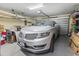 Spacious garage with a silver car parked inside, offering ample storage space at 320 Cog Hill Ct., Murrells Inlet, SC 29576