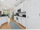 Functional kitchen with white cabinets, stainless steel appliances, and granite counters at 320 Cog Hill Ct., Murrells Inlet, SC 29576