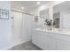 Clean bathroom featuring double vanity, walk-in shower, and modern fixtures for a luxurious experience at 417 Flank St., Myrtle Beach, SC 29588