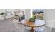 Dining area featuring a round table, white chairs, and views of the outdoor area at 417 Flank St., Myrtle Beach, SC 29588