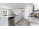 Bright kitchen with stainless steel appliances and a granite countertop island at 417 Flank St., Myrtle Beach, SC 29588