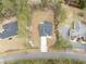Aerial view of a home showing a large backyard, driveway and neighborhood at 480 N Boundaryline Dr. Nw, Calabash, NC 28467