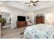 Spacious bedroom with tv, closet, bathroom and hardwood floors at 480 N Boundaryline Dr. Nw, Calabash, NC 28467
