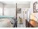 Bedroom featuring four-poster bed and view of the en suite bathroom at 480 N Boundaryline Dr. Nw, Calabash, NC 28467