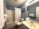 This bathroom has a tub/shower combo and a single sink vanity with a mirror and soft towels at 524 Pinehurst Ln. # 19D, Pawleys Island, SC 29585