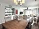 Open-concept dining and living area with hardwood floors and stylish decor at 524 Pinehurst Ln. # 19D, Pawleys Island, SC 29585