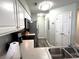 Well-lit kitchen with stainless steel appliances, ample counter space, and white cabinets at 524 Pinehurst Ln. # 19D, Pawleys Island, SC 29585