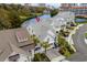 Aerial view of waterfront home with lush landscaping and a serene waterway location at 5361 Ocean Village Dr., Myrtle Beach, SC 29577