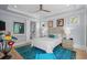 Serene bedroom with stylish decor, ceiling fan, and access to an ensuite bathroom at 5361 Ocean Village Dr., Myrtle Beach, SC 29577