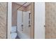 This bathroom has patterned wallpaper and a shower/bathtub combo with a showerhead at 5525 Springs Ave., Myrtle Beach, SC 29577
