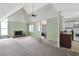 Open-concept living area features a fireplace, vaulted ceiling, and seamless flow to the kitchen at 5525 Springs Ave., Myrtle Beach, SC 29577