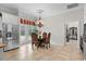 Cozy breakfast nook with a chandelier and access to a patio at 5628 Marion Circle, Myrtle Beach, SC 29577